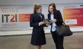 Visitors and hostess at IT2Industry 2014